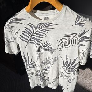 Free Planet Light Gray Tee with Black Leaf Design